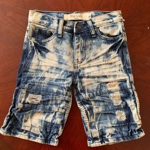 Boys distressed jean shorts.